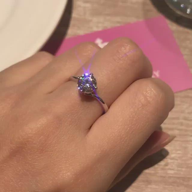 NT11 - Four Prong Twist Solitaire Engagement Ring